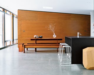 10 Prefabricated or Modular Structures That Use Plywood in Creative Ways - Photo 4 of 11 - Architect William Massie designed this hybrid prefab home for a vintage furniture dealer in upstate New York. It has a curtain wall that's constructed with steel supports and sandwiched layers of birch plywood and amber acrylic.