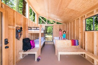 10 Prefabricated or Modular Structures That Use Plywood in Creative Ways - Photo 11 of 11 - Students from California State Polytechnic University, Pomona, designed these cabins to be placed at campgrounds throughout the state. Named "The Wedge," this sloped-roof, wooden structure with plywood interior walls was built in just four days.