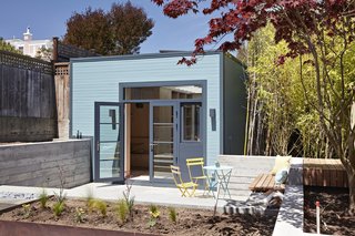 An old unused garage at a family home in San Francisco is turned into a "box suffused with light." Just a short distance from the main house, it's a place where the family members can escape to meditate, relax, paint, or just get creative.