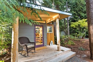 This prefabricated studio shed by Modern-Shed Inc. in Vahon Island, Washington, serves as a peaceful creative workspace for a professional artist.