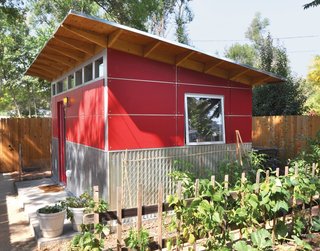 When a Colorado web designer’s newborn daughter was given his home office, he moved his workspace to this quaint shed made with ruby-red Collins Truwood Siding and corrugated metal.