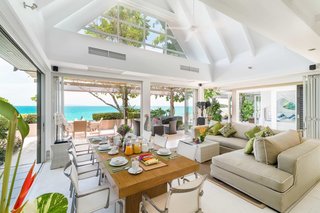 Located along Taling Ngam Beach, The Headland is a group of five individual villas built with natural materials such as limed hardwoods and thatched roofs. Each of the villas is furnished with a clean, monochromatic palette and has three glass doors in the living room that can be fully opened to let in cool sea breezes.