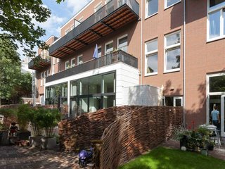 An Old Amsterdam School Is Converted Into 10 Apartments - Photo 2 of 15 -