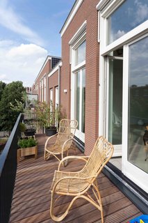An Old Amsterdam School Is Converted Into 10 Apartments - Photo 14 of 15 -
