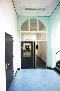An Old Amsterdam School Is Converted Into 10 Apartments - Photo 6 of 15 - Details of the original school.