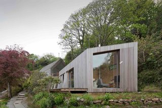 This Company Can Design, Build, and Deliver a Sustainable Prefab in Just 12 Weeks - Photo 3 of 13 - Ecospace holiday retreats, like this one in Cornwall, are larger scale versions of their modular studios and include bathrooms, kitchens, and bedrooms. It would make a perfect little vacation home or hotel room on a beautiful natural site.