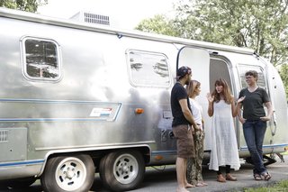 Kate Oliver and partner Ellen Prasse turned a 1976 Sovereign Airstream RV into a bright and cozy home, and used it on their six-month adventure to places like Alaska and the Yukon Territory. They loved mobile living so much that they now operate their own RV renovation business—The Modern Caravan.