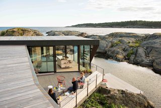 A Norwegian Summer Cabin Embraces the Rocky Terrain - Photo 3 of 10 -