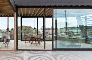 A Norwegian Summer Cabin Embraces the Rocky Terrain - Photo 4 of 10 -
