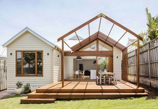 A new outdoor deck addition, which meets the local council’s requirements for site coverage, was built in the rear garden.