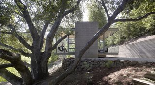 Designed by California-based architects Swatt Miers, these three teahouses on a private property were conceived as spaces outside the main home that would be free from the distractions of internet, telecommunications, and television. The largest of the three pavilions is used as a workspace, the second as a bedroom, and the third as a meditation pavilion.