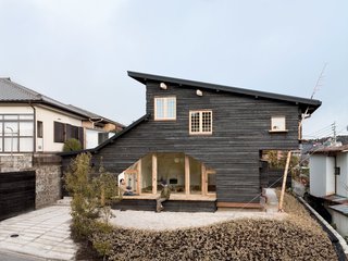 Another charred wood siding residence by Fujimori, the compact Coal House has a tearoom on the second story that's accessible from the exterior by a timber ladder, and from the interior by a secret door in the master bedroom.