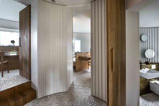 Stay in This Danish Vacation Home Made Up of 9 Log-Clad Cylinders - Photo 5 of 14 -