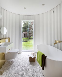 Stay in This Danish Vacation Home Made Up of 9 Log-Clad Cylinders - Photo 10 of 14 -
