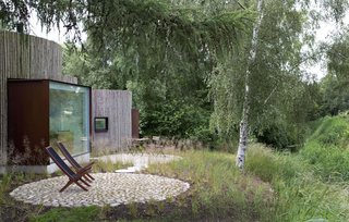 Stay in This Danish Vacation Home Made Up of 9 Log-Clad Cylinders - Photo 14 of 14 -