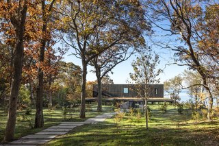 An Incredible Cedar-Clad House Captures Views of the Sea and Forest - Photo 1 of 12 -
