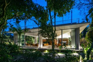A Concrete Home in Brazil Lets the Owners Practically Live in the Jungle - Photo 1 of 12 -