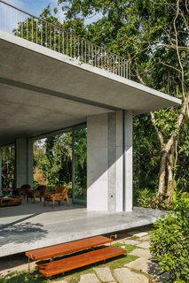 A Concrete Home in Brazil Lets the Owners Practically Live in the Jungle - Photo 4 of 12 -