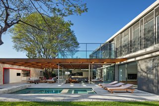 This Brilliant Brazilian Abode Was Designed Around an Imposing Tree - Photo 4 of 11 -