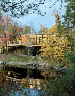 Architect Charlie Lazor designed this peaceful, lakeside prefab in Ontario, Canada with a Japanese-style bathroom, clad in teak, with a matching tub and sink by Bath in Wood.
