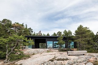 The contemporary Isokari is composed of two buildings that share a roof. The shared roof creates an efficient terrace between the two structures. 