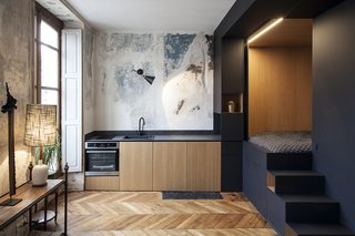 The sleeping nook can be accessed via steps with storage underneath.