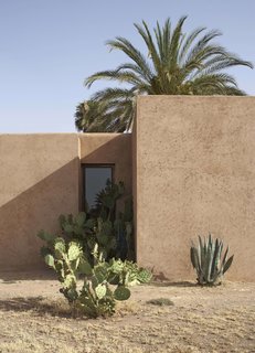 Narrow slits and small apertures take the place of conventional openings in Villa D.