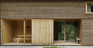 A "schof"—a type of closed porch that’s common in the Alpine region of Austria—links the corridor-kitchen to the western side of the house.