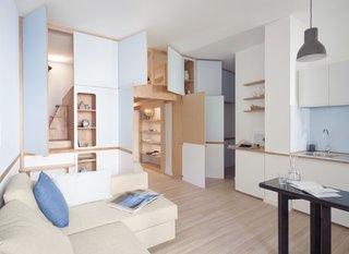 A cabinetry wall is constructed from marine plywood.