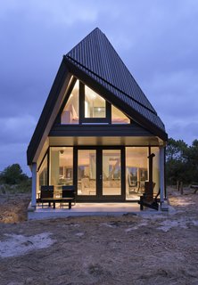 A covered porch on the ground floor