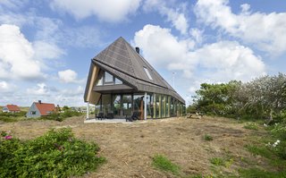 The abode's high roof was inspired by the De Waard Albatross tent.