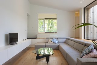 A Noguchi coffee table is a focal point in the living lounge.