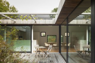 In the summer months, a grapevine in the courtyard provides shade.<br>