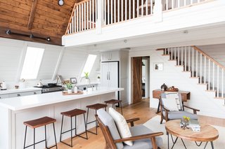 After: With the orientation of the kitchen work areas altered during the remodel, sunlight from the slanting windows can now better illuminate the cooking station.