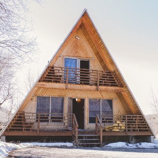 Before: The exterior of the cabin, which was built over 30 years ago.