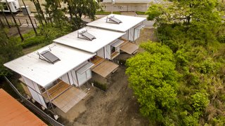 The Franceschi Container Houses are three independent living units totaling 2,260 square feet, and are built from used, 40-foot-high cargo containers placed side by side.