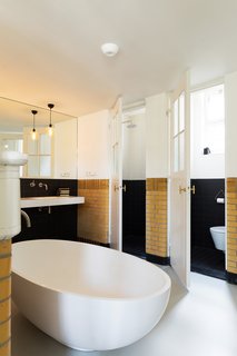 A 20th-Century Dutch Schoolhouse Now Holds a Series of Airy Lofts - Photo 9 of 13 -