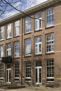 A 20th-Century Dutch Schoolhouse Now Holds a Series of Airy Lofts - Photo 1 of 13 - A school in Rotterdam that was built in 1912 was converted into six apartments.