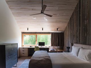A guest bedroom is also located on the ground floor.