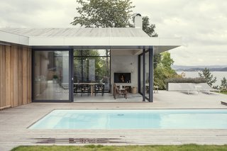 The new extension connects the pool deck and lawn.