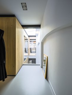A 19th-Century Dutch Workshop Is Now a Stunning, Spacious Loft - Photo 10 of 13 - A peek at one of the long, narrow hallways.