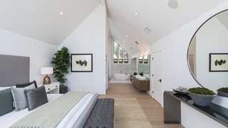 Red Hot Chili Peppers Frontman Anthony Kiedis' Former L.A. Abode Asks $3.2M - Photo 8 of 13 - The master bedroom has a bathroom with a deep soaking tub.