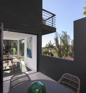 Red Hot Chili Peppers Frontman Anthony Kiedis' Former L.A. Abode Asks $3.2M - Photo 2 of 13 - The dining area connects to an outdoor terrace.