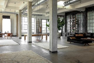 The loft's concrete floors and zinc windows were restored to showcase their original beauty.