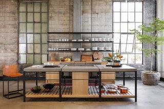 The faucets—which are made of copper pipe fittings—reference the history of the building and its industrial roots.