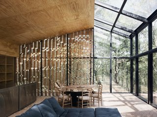 The back wall, as well as part of the roof, is fitted with plywood sheathing.