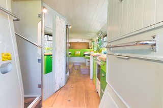 The kitchen and bathroom sit along the corridor of the lower level.