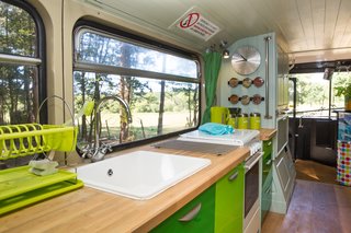 The kitchen comes with a sink, oven and cooktop.