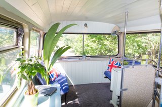 The original seats of the bus were restored to create a relaxing lounge area.