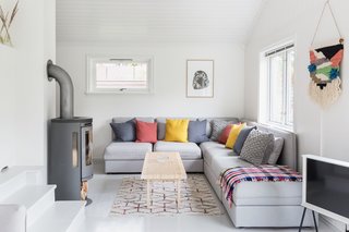 A wood-burning fireplace keeps the second living lounge warm and toasty in winter.